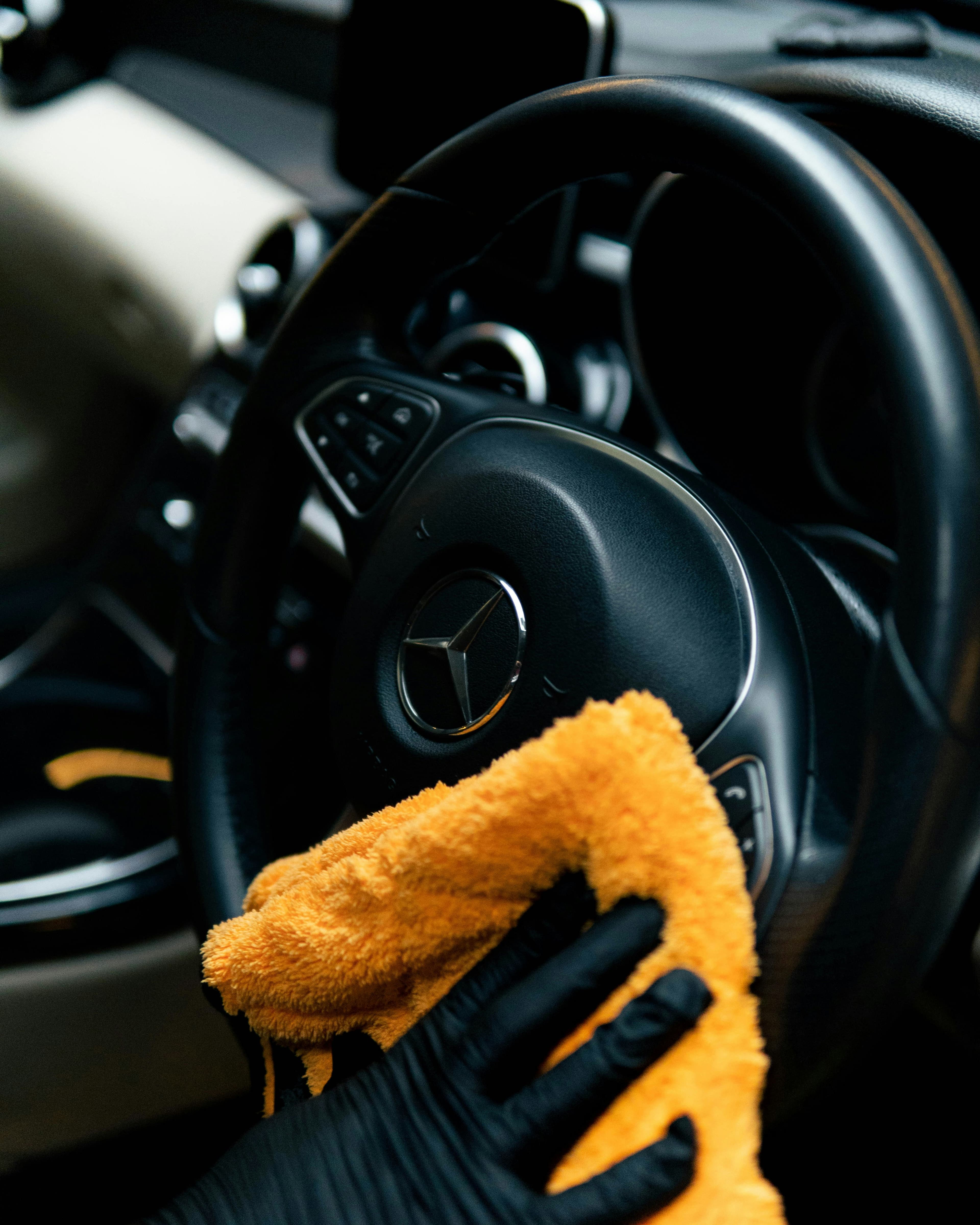 A Mercedes interior being carefully detailed